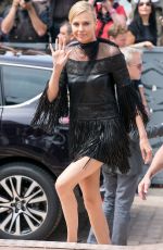 CHARLIZE THERON at Mad Max: Fury Road Photocall in Cannes