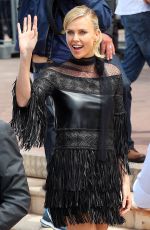 CHARLIZE THERON at Mad Max: Fury Road Photocall in Cannes