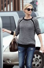 CHARLIZE THERON Out and About in Hollywood 05/26/2015