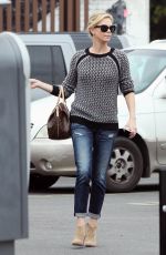 CHARLIZE THERON Out and About in Hollywood 05/26/2015