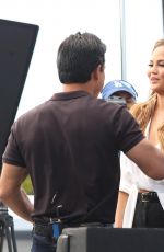 CHRISSY TEIGEN on the Set of Extra in Los Angeles