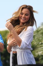 CHRISSY TEIGEN on the Set of Extra in Los Angeles