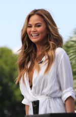CHRISSY TEIGEN on the Set of Extra in Los Angeles
