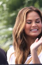 CHRISSY TEIGEN on the Set of Extra in Los Angeles