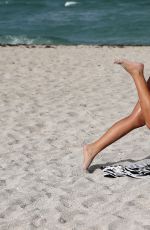 CLAUDIA ROMANI in Bikini at a Beach in Miami 05/17/2015