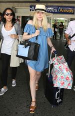 DAKOTA FANNING Arrives at Airport in Nice 05/11/2015