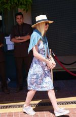 DAKOTA FANNING Out and About in Cannes 05/12/2015