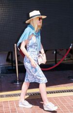 DAKOTA FANNING Out and About in Cannes 05/12/2015