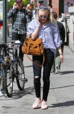 DAKOTA FANNING Out and About in New York 04/30/2015