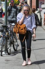 DAKOTA FANNING Out and About in New York 04/30/2015