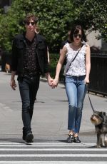 DAKOTA JOHNSON Walks Her Dog Out in New York 05/24/2015