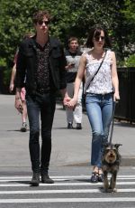 DAKOTA JOHNSON Walks Her Dog Out in New York 05/24/2015