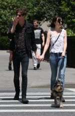 DAKOTA JOHNSON Walks Her Dog Out in New York 05/24/2015