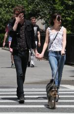 DAKOTA JOHNSON Walks Her Dog Out in New York 05/24/2015