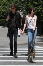 DAKOTA JOHNSON Walks Her Dog Out in New York 05/24/2015