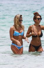 DEVIN BURGMAN and NATSHA OAKLEY in Bikinis at a Beach in Miami 05/06/2015