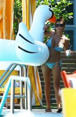 DEVIN BURGMAN and NATSHA OAKLEY in Bikinis at a Pool in Miami 05/07/2015