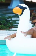 DEVIN BURGMAN and NATSHA OAKLEY in Bikinis at a Pool in Miami 05/07/2015
