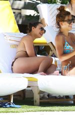 DEVIN BURGMAN and NATSHA OAKLEY in Bikinis at a Pool in Miami 05/07/2015