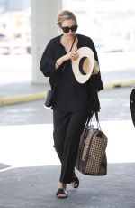 ELIZABETH OLSEN at JFK Airport in New York 04/29/2015