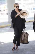 ELIZABETH OLSEN at JFK Airport in New York 04/29/2015
