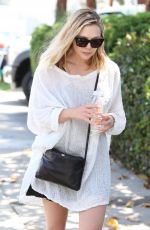 ELIZABETH OLSEN Leaves Farmer