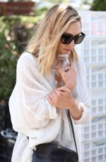 ELIZABETH OLSEN Leaves Farmer
