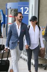 EVA LONGORIA and Jose Antonio Baston at Airport in Paris