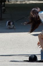 FAMKE JANSSEN Walks Her Dog Out in New York 05/07/2015