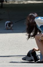 FAMKE JANSSEN Walks Her Dog Out in New York 05/07/2015