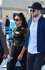 FKA TWIGS and Robert Pattinson at JFK Airport in New York 05/03/2015