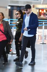 FKA TWIGS and Robert Pattinson at JFK Airport in New York 05/03/2015