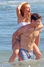 BELLA THORNE in White Bikini at a Beach