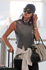 IRINA SHAYK at Heathrrow Airport in London