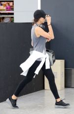 IRINA SHAYK at Heathrrow Airport in London