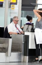 IRINA SHAYK at Heathrrow Airport in London