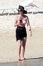 JANUARY JONES in Bikini Top on the Beach in Hawaii 05/03/2015
