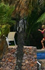 JESSICA SIMPSON in Bikini at a Pool 06/11/2006