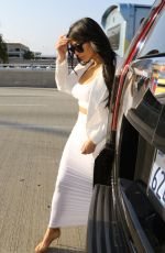 KIM KARDASHIAN Arrives at LAX Airport in Los Angeles 05/09/2015
