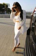 KIM KARDASHIAN Arrives at LAX Airport in Los Angeles 05/09/2015