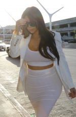 KIM KARDASHIAN Arrives at LAX Airport in Los Angeles 05/09/2015