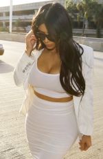 KIM KARDASHIAN Arrives at LAX Airport in Los Angeles 05/09/2015