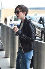 LILY COLLINS in Ripped Jeans at JFK Airport 05/05/2015