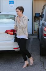 LILY COLLINS Leaves a Hair Salon in West Hollywood 05/15/2015