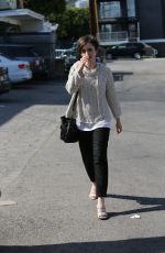LILY COLLINS Leaves a Hair Salon in West Hollywood 05/15/2015