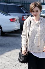 LILY COLLINS Leaves a Hair Salon in West Hollywood 05/15/2015