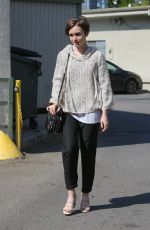LILY COLLINS Leaves a Hair Salon in West Hollywood 05/15/2015