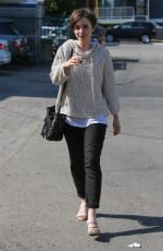 LILY COLLINS Leaves a Hair Salon in West Hollywood 05/15/2015