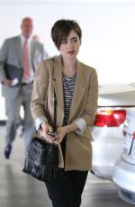 LILY COLLINS Out and About in Beverly Hills 05/28/2015