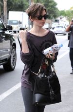 LILY COLLINS Out Shopping in Los Angeles 05/06/2015